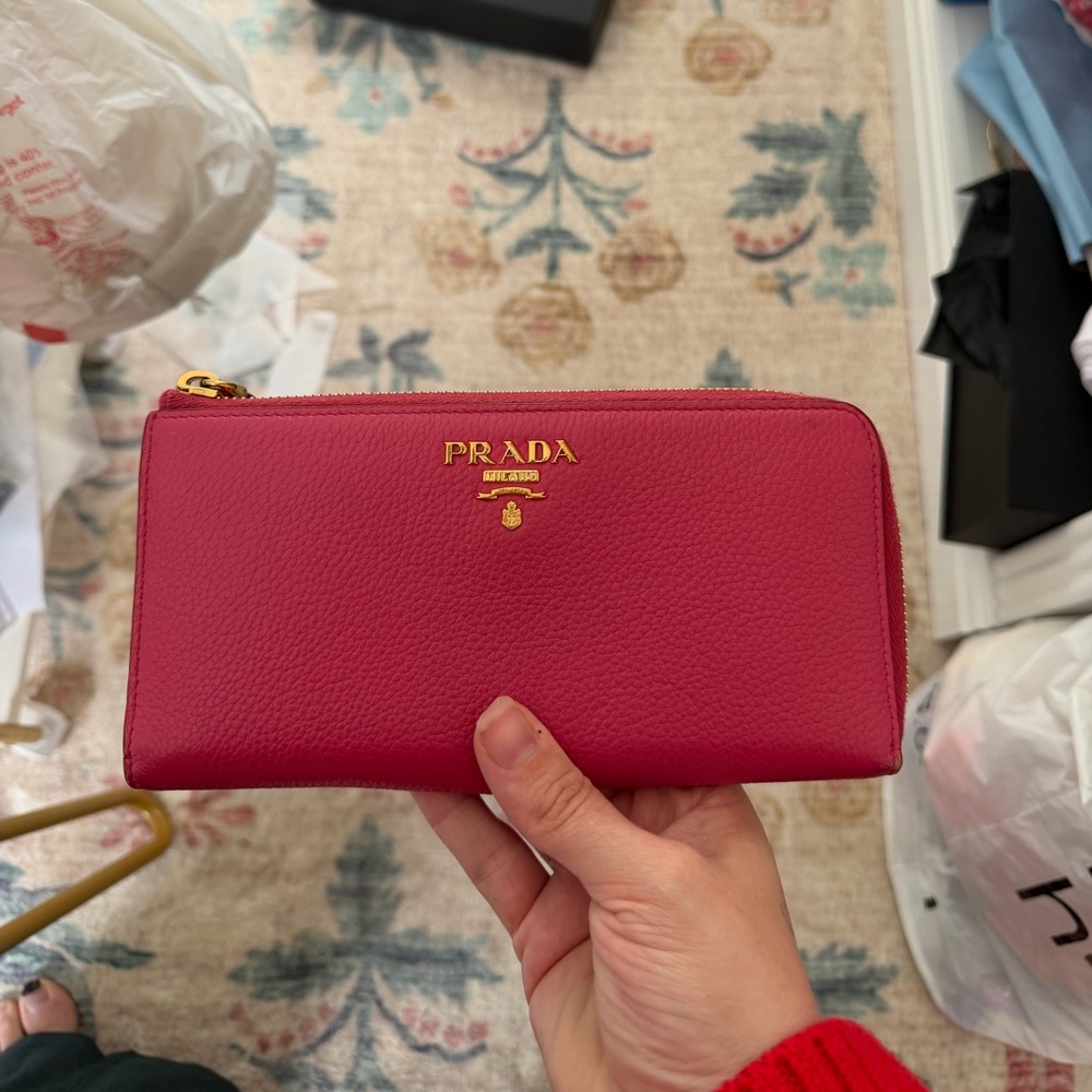Authentic Prada pink Vitello Daino leather continental wallet.